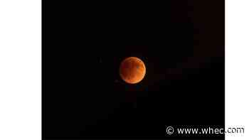 Lunar eclipse turns moon red over Rochester