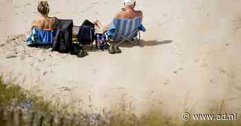 Eerste officiële zomerse dag in De Bilt, morgen code geel voor onweer - AD.nl