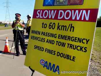 New project between Edmonton police, AMA to address drivers speeding past tow truck operators - Edmonton Journal