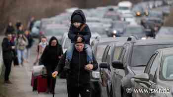 Erste Geflüchtete aus Ukraine im Ankunftszentrum Heidelberg - SWR Aktuell