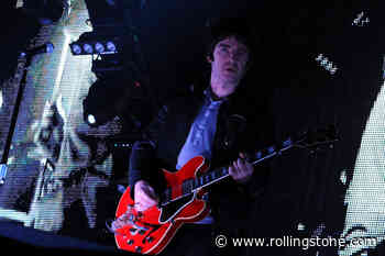 The Busted Guitar From Oasis’ Big Break-Up Fight Sells at Auction for Over $400,000