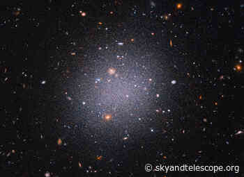 A Cosmic Collision Could Have Made Two Dark Matter–Less Galaxies