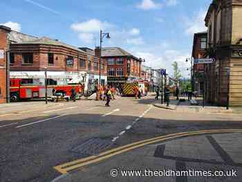 Emergency services in Oldham town centre after man spotted on pub roof - The Oldham Times