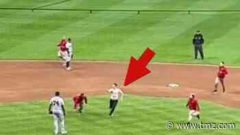 Shirtless MLB Fan Runs Wild On Field During Brewers Game, Jukes Security Guards
