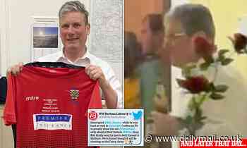Beergate: Labour leader who said he'd ben at work posed with football shirt on evening of THAT curry