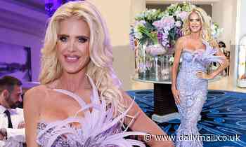 Victoria Silvstedt puts on a busty display in a sheer plunging lilac gown in Cannes