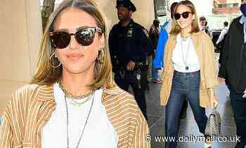 Jessica Alba oozes casual chic in jeans and an open striped button-down on a stroll around NYC
