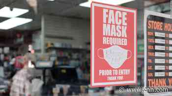 A third of people in US should consider masking based on their Covid-19 risk, CDC director says