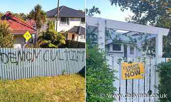 Sydney woman finds the words 'demon cultist' graffitied on her fence after putting up climate sign - Daily Mail