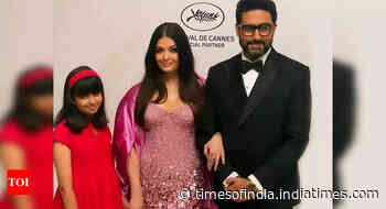 Aishwarya poses for a family photo at Cannes