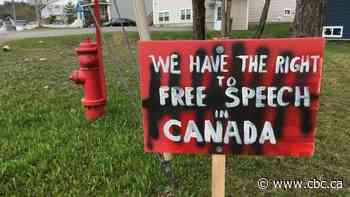 Signs of trouble: Corner Brook residents say they'll defy order to end crematorium protest - CBC.ca