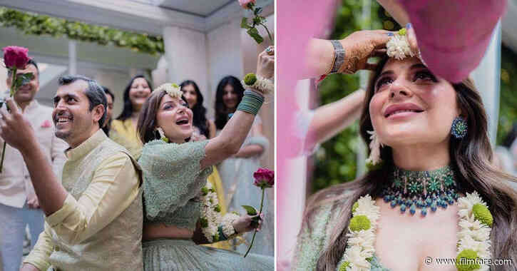 Kanika Kapoor is a happy bride-to-be at her Mehendi ceremony in London