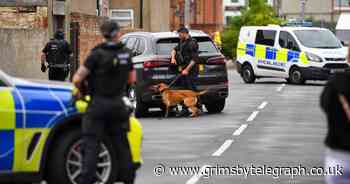 Wanted Grimsby man arrested during raid by armed police at East Marsh house - Grimsby Live