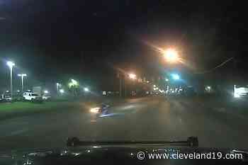 Speeding motorcyclist crashes into vehicle, curb during pursuit in Parma (dash camera video) - Cleveland 19 News
