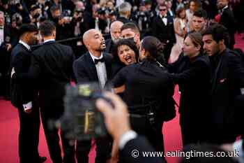 Woman strips off in Cannes red carpet protest - Ealing Times