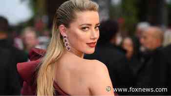 Amber Heard is both 'the mom and the dad' to baby girl Oonagh Paige
