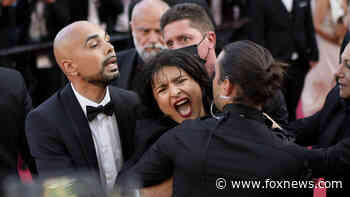 Cannes Film Festival: Topless protester disrupts ‘Three Thousand Years of Longing’ red carpet premiere