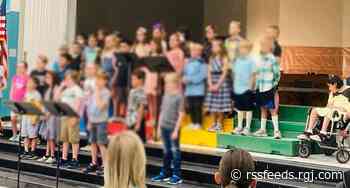 In her wheelchair and separated from classmates, a WCSD student watched her own concert