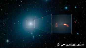 What does a giant black hole and its galaxy sound like?