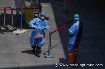 Beijing extends work-from-home order as COVID-19 cases rise - Delta Optimist