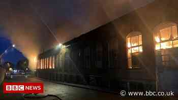 Oldham fire: Crews tackle large blaze at building - BBC