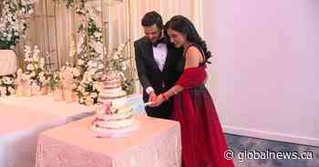 Battle of Alberta wedding edition: Duelling fans celebrate nuptials overlooking Oilers watch party