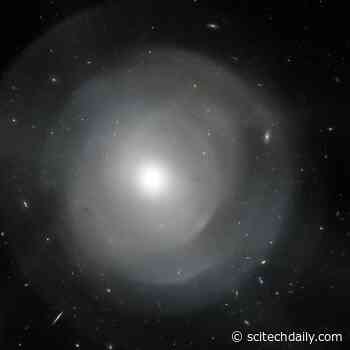 Hubble Space Telescope Peers Through Giant Elliptical Galaxy’s Layers