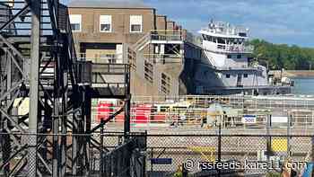 Tow boat collides with Mississippi River lock and dam