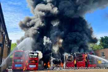 Picture shows six buses ablaze in Potters Bar garage fire