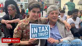 Millionaires at Davos say 'tax us more'