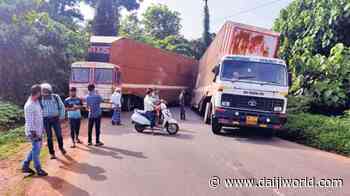 Puttur: Two container trucks get stuck in roadside ditch - Three-hour traffic jam on NH - Daijiworld.com