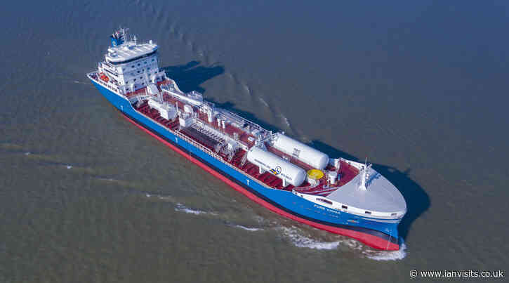 Unusual tanker ship passing through Tower Bridge