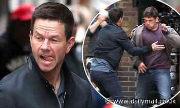 Mark Wahlberg tackles co-star for scene as he works on action-filled shots in London - Daily Mail