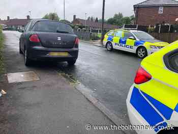 Bolton: Police dog tracks down driver who 'hid in a garden' - The Bolton News
