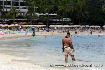 Pandemic-weary Americans plan for summer despite COVID surge - Red Deer Advocate