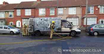 Burnt van remains left on street for two months
