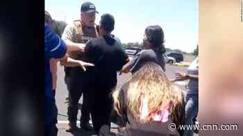 Parents seen frustrated with police at shooting scene in new video