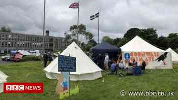 Climate campaigners refuse to leave Cornwall Council grounds - BBC