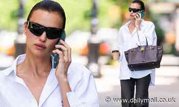Irina Shayk puts high fashion spin on business casual as she swings Birkin bag during NYC coffee run