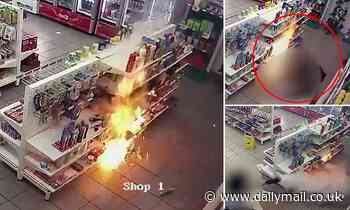 Dramatic moment man attempts to blow up a service station by dousing - Daily Mail