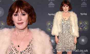 Molly Ringwald sparkles in silver sequin dress at The Moth Ball 25th anniversary gala in New York