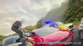 M65: Dramatic scenes on motorway as police "box in" stolen car