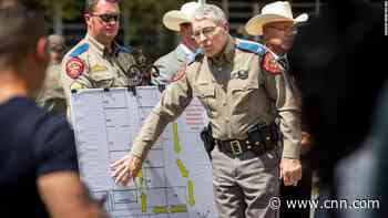 Officers stood in hallway outside classrooms as children repeatedly called 911 for help