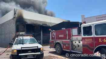 Fuerte incendio se registra en bodega en Tlaxcalancingo - Cinco Radio