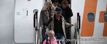 Guerre en Ukraine: un vol nolisé de réfugiés arrive à Montréal