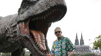 Schauspieler Jeff Goldblum und der T-Rex in Köln