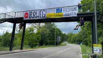 Klimaaktivisten seilen sich von Brücke in Ulm ab - SWR Aktuell