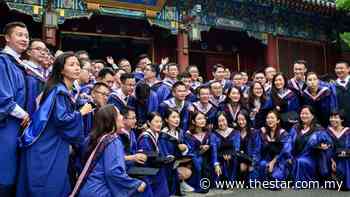China's coronavirus lockdowns and slowing economy pushing job-hungry graduates overseas as poor students get left behind - The Star Online
