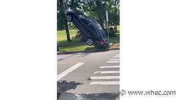 Car suspended in air by power lines, RPD confirms