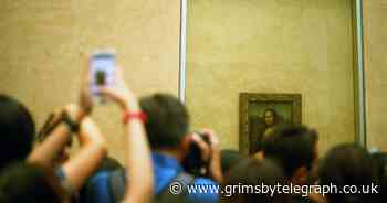 Mona Lisa attacked with cake by climate change protester - Grimsby Live